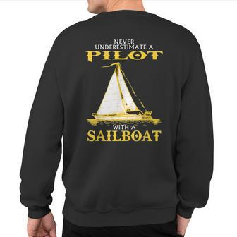 Never Underestimate Sailboat Pilot Sweatshirt Back Print - Seseable