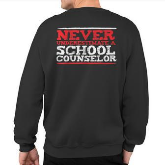 Never Underestimate A School Counselor Sweatshirt Back Print - Monsterry UK