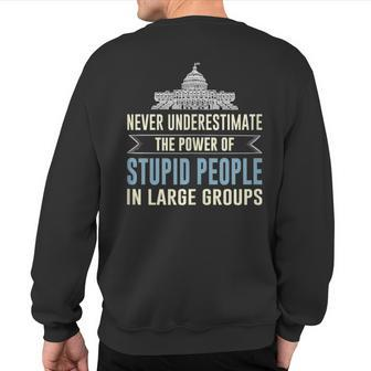 Never Underestimate Stupid People In Large Groups Sweatshirt Back Print | Mazezy