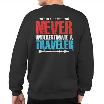 Never Underestimate A Traveler Sweatshirt Back Print - Seseable