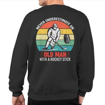 Vintage Never Underestimate An Old Man With A Hockey Stick Sweatshirt Back Print - Thegiftio UK