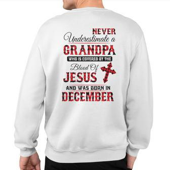 Never Underestimate A December Grandpa The Blood Of Jesus Sweatshirt Back Print - Monsterry DE