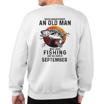 Never Underestimate Man Who Loves Fishing September Sweatshirt Back Print - Thegiftio UK