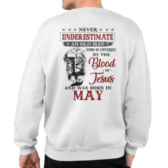 Never Underestimate A May Man Covered By Blood Of Jesus Sweatshirt Back Print - Seseable