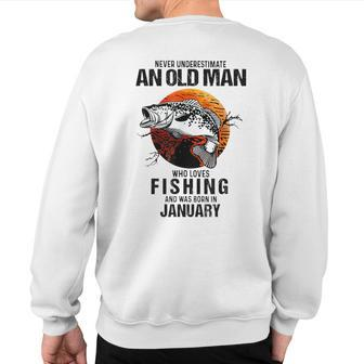 Never Underestimate An Old January Man Who Loves Fishing Sweatshirt Back Print | Mazezy