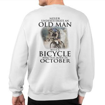 Never Underestimate An Old Man With A Bicycle Born October Sweatshirt Back Print - Thegiftio UK