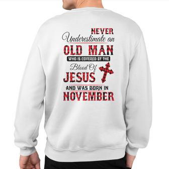 Never Underestimate An Old Man Blood Of Jesus November Sweatshirt Back Print - Thegiftio UK