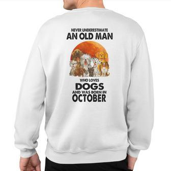 Never Underestimate An Old Man Who Loves Dogs Born October Sweatshirt Back Print | Mazezy