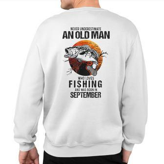 Never Underestimate An Old September Man Who Loves Fishing Sweatshirt Back Print | Mazezy