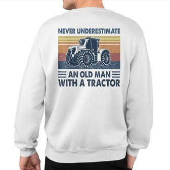 Vintage Never Underestimate An Old Man With A Tractor Sweatshirt Back Print - Monsterry