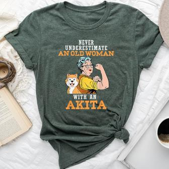 Never Underestimate An Old Woman With An Akita Bella Canvas T-shirt | Mazezy