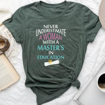 Never Underestimate A Woman With A Master's Bella Canvas T-shirt - Monsterry