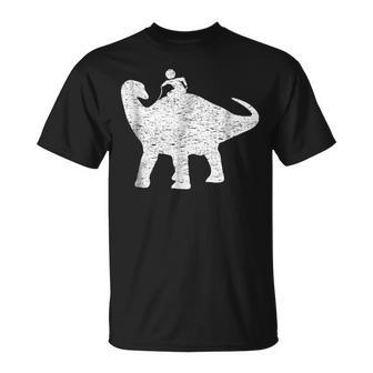 Kids Riding Funny Dinosaur Cute Funny Dino Gift Dinosaur Funny Gifts Unisex T-Shirt | Mazezy UK