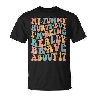My Tummy Hurts But Im Being Really Brave About It Groovy IT Funny Gifts Unisex T-Shirt | Mazezy