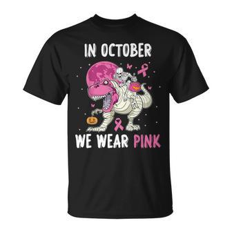 In October We Wear Pink Breast Cancer Dino Pumpkin Halloween T-Shirt - Seseable