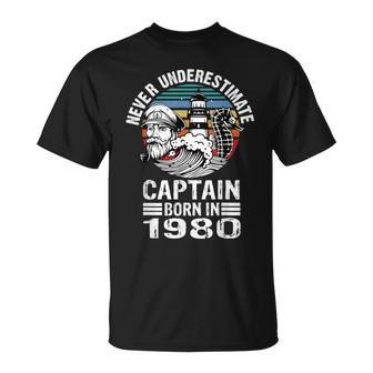 Never Underestimate Captain Born In 1980 Captain Sailing T-Shirt | Mazezy