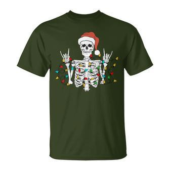 Christmas Skeleton Rocker Wrapped In Xmas Lights Santa Hat T-Shirt - Monsterry UK