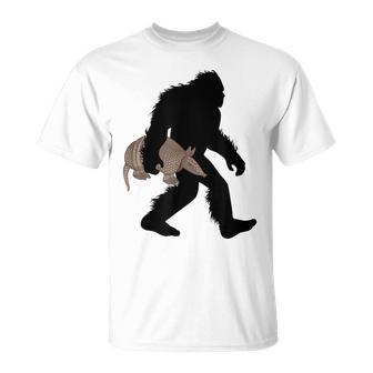 Bigfoot Cradling Armadillo Cryptid Sasquatch Unisex T-Shirt | Mazezy