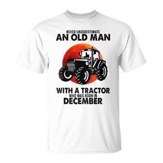 Never Underestimate An Old Man With A Tractor Born December Unisex T-Shirt - Seseable