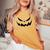 Scary Spooky Jack O Lantern Face Pumpkin Halloween Women's Oversized Comfort T-shirt Mustard