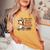 Western Country Cowgirl I Just Smile And Say God Bless Women's Oversized Comfort T-shirt Mustard