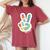 Retro Tie Dye Peace Sign Be Kind Peace Love Kindness Women's Oversized Comfort T-shirt Crimson