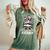 Football Girl Classy Until Kickoff Messy Bun Game Day Vibes Women's Oversized Comfort T-Shirt Moss
