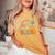 Be Kind Retro Rainbow Peace Sign Love Hippie Flowers 60S 70S Women's Oversized Comfort T-shirt Mustard