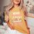 Never Underestimate A Mother Fueled By Prayer Mother's Day Women's Oversized Comfort T-Shirt Mustard