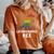 Lesbosaurus Rex Dinosaur In Rainbow Flag For Lesbian Pride Women's Oversized Comfort T-Shirt Yam