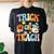 Groovy Halloween Trick Or Teach Retro Pumpkin Ghost Teacher Women's Oversized Comfort T-shirt Back Print Black