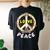 Retro 60S & 70S Floral Hippie Daisy Peace Sign Love Peace Women's Oversized Comfort T-Shirt Back Print Black