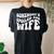 Wife Somebodys Spoiled Ass Wife Retro Groovy Women's Oversized Comfort T-Shirt Back Print Black