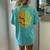 They Whispered To Her You Cant Withstand The Storm Sunflower Women's Oversized Comfort T-Shirt Back Print Chalky Mint