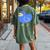 A Small Minimally Designed And Illustrated Blue Duck Women's Oversized Graphic Back Print Comfort T-shirt Moss