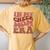 In My Cheer Mom Era Retro Groovy Vintage Cheerleading Mother Women's Oversized Comfort T-Shirt Back Print Mustard