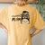 Cute Volleyball Mom Leopard Print Messy Bun Women's Oversized Comfort T-Shirt Back Print Mustard