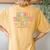In My Teacher Era Kindergarten Version Retro Back To School Women's Oversized Comfort T-Shirt Back Print Mustard