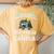 Never Underestimate An Old Woman With A Camper Women's Oversized Comfort T-Shirt Back Print Mustard