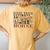 Never Underestimate An Old Woman With A Horse Women's Oversized Comfort T-Shirt Back Print Mustard