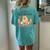 Never Underestimate An Old Woman With A Pomeranian Women's Oversized Comfort T-Shirt Back Print Chalky Mint