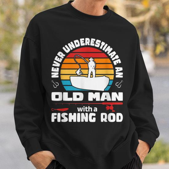 https://i3.cloudfable.net/styles/550x550/27.81/Black/never-underestimate-an-old-man-with-a-fishing-rod-ice-fish-sweatshirt-20230704112515-rcn451kx.jpg