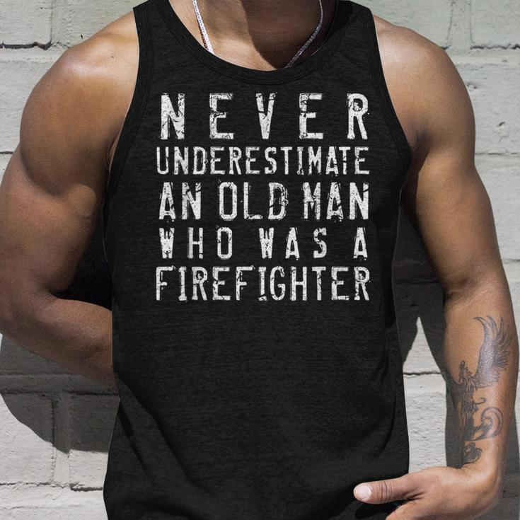 Never Underestimate An Old Man Firefighting Firefighter Gift Unisex Tank Top Gifts for Him