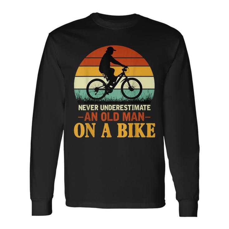 Never Underestimate Quote An Old Man On A Bicycle Retr Long Sleeve T-Shirt