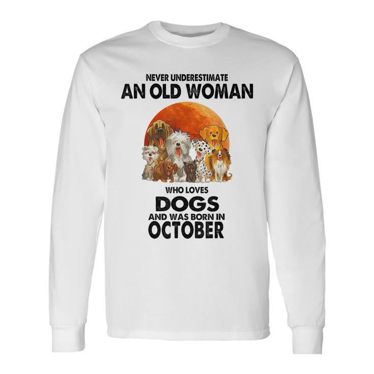 Never Underestimate An Old Woman Who Loves Dogs Born October Old Woman Long Sleeve T-Shirt T-Shirt