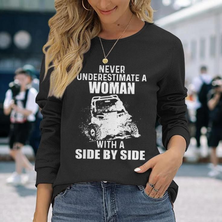 Never Underestimate A Woman With A Side By Side Long Sleeve T-Shirt T-Shirt Gifts for Her