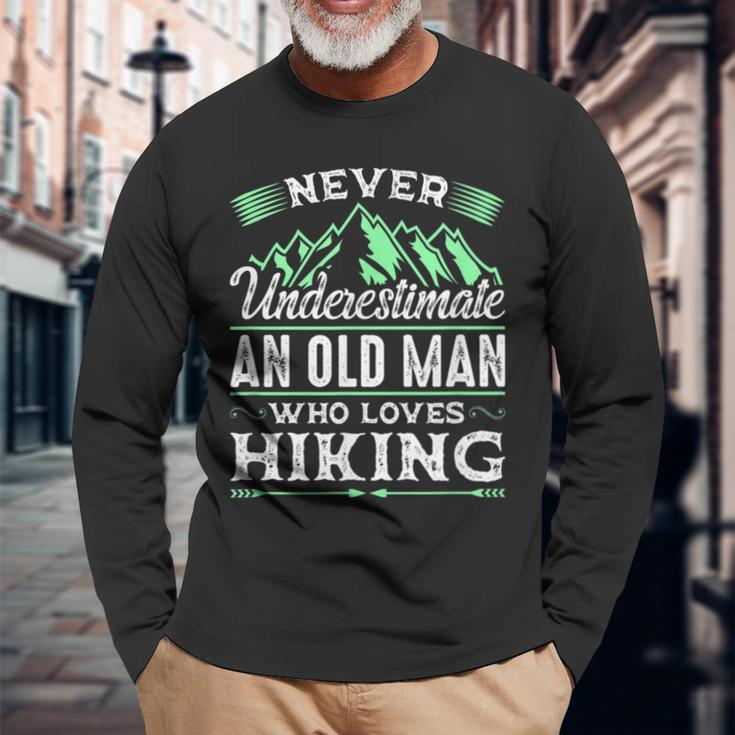 Never Underestimate An Old Man Who Loves Hiking Long Sleeve T-Shirt Gifts for Old Men