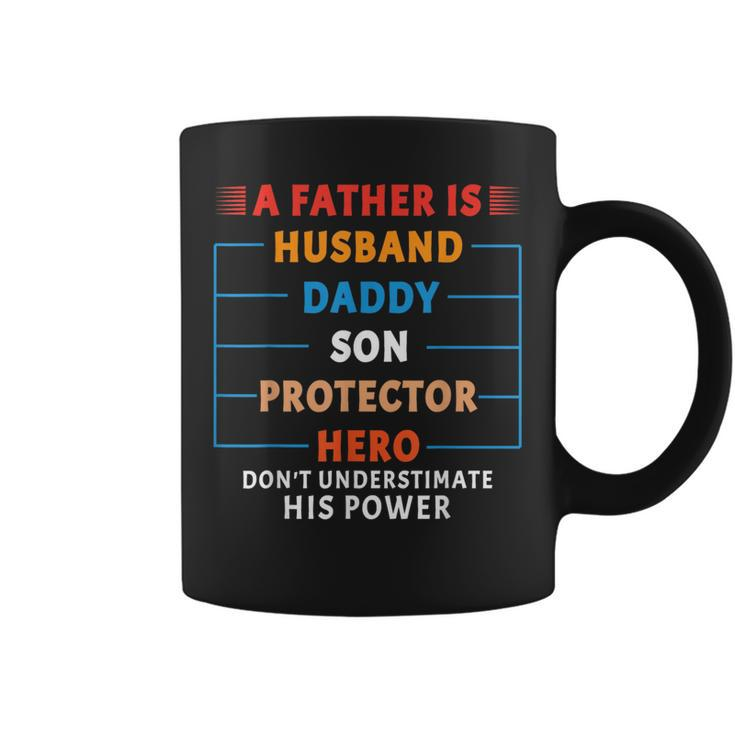 A Father Is Husband Daddy Son Protector Hero Fathers Day  Coffee Mug
