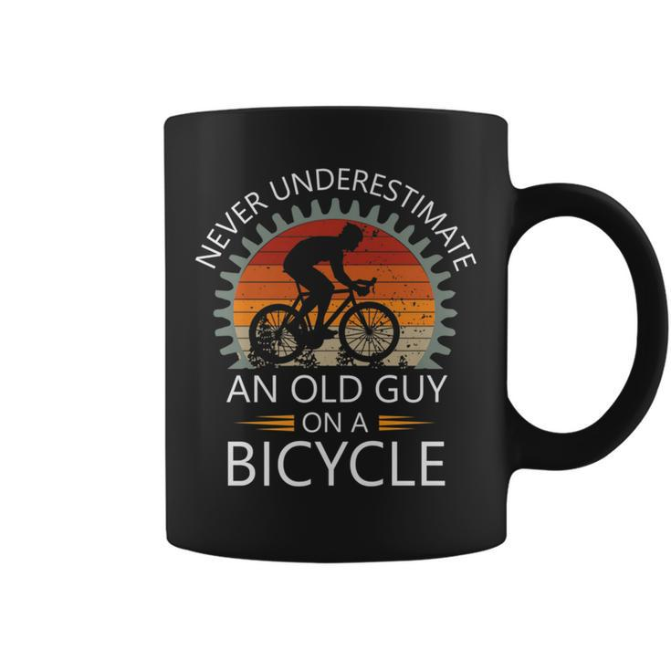 An Old Guy On A Bicycle Cycling Vintage Never Underestimate Cycling Funny Gifts Coffee Mug