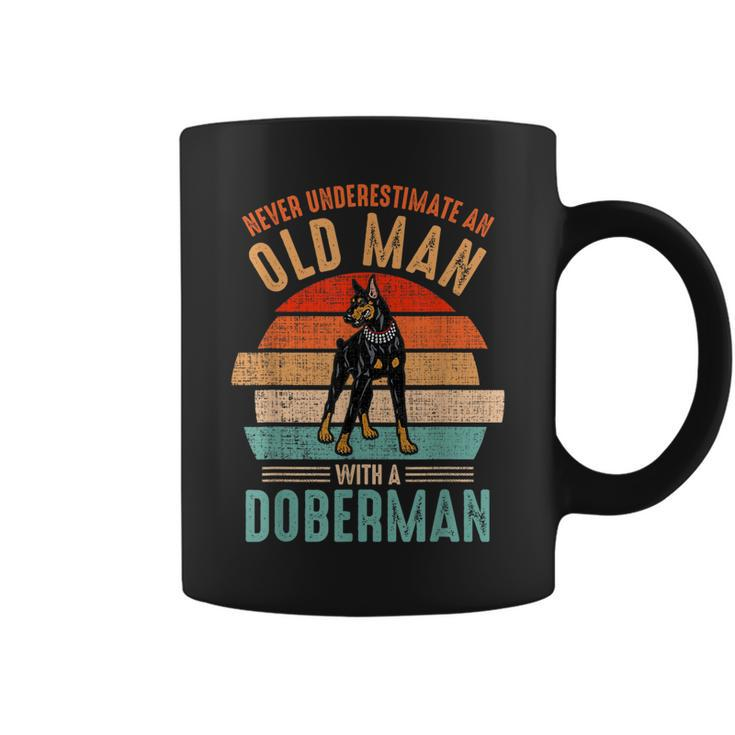 Mb Never Underestimate An Old Man With A Doberman Coffee Mug